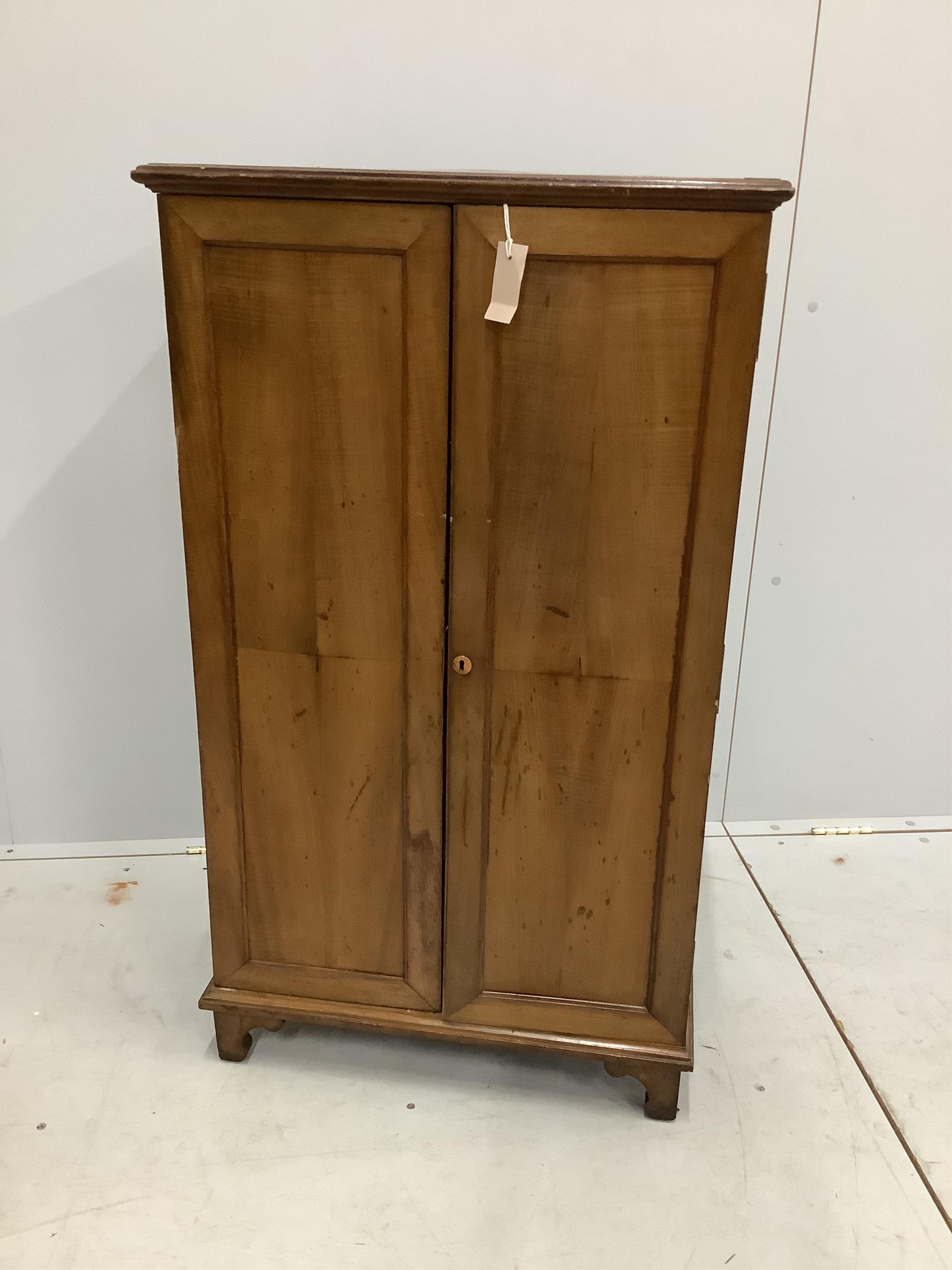 An early 20th century walnut office cabinet fitted with nine deep drawers, width 61cm, height 106cm. Condition - fair, a little faded